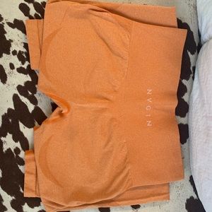 Nvgtn orange contour leggings